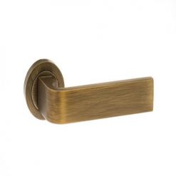 Atlantic Handles Monza Forme Designer Lever on Contempo Round Rose in a Yester Bronze Finish Pair of Door Handles