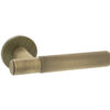Millhouse Brass Crompton Knurled Lever Door Handle on 5mm Slimline Round Rose - Yester Bronze