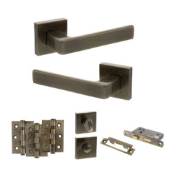 STATUS Montana Door Handle Pack (Bathroom Set - 3" CE Bathroom Lock, 3" Fire Rated Hinges x3) - Antique Brass