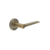 Knightsbridge Door Handle on Chamfered Rose Antique Brass