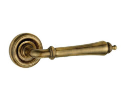 Camille Door Handle on Rose Antique Brass